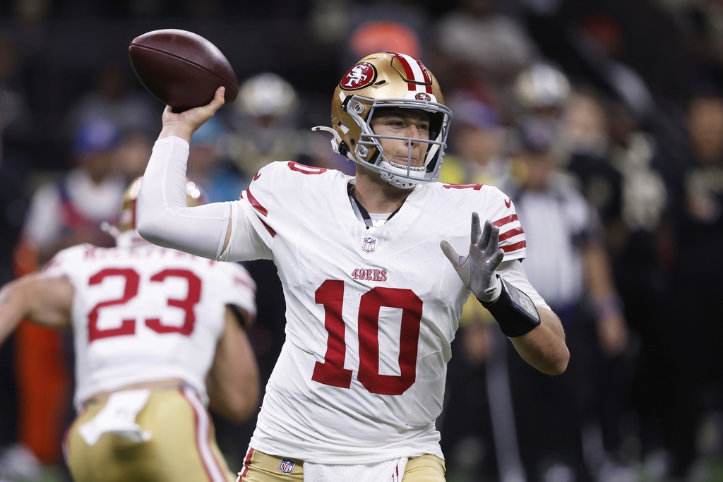 San Francisco 49ers quarterback Mac Jones (10) passes against the New Orleans Saints during the first half of an NFL football game in New Orleans, Sunday, Sept. 14, 2025. (AP Photo/Butch Dill)