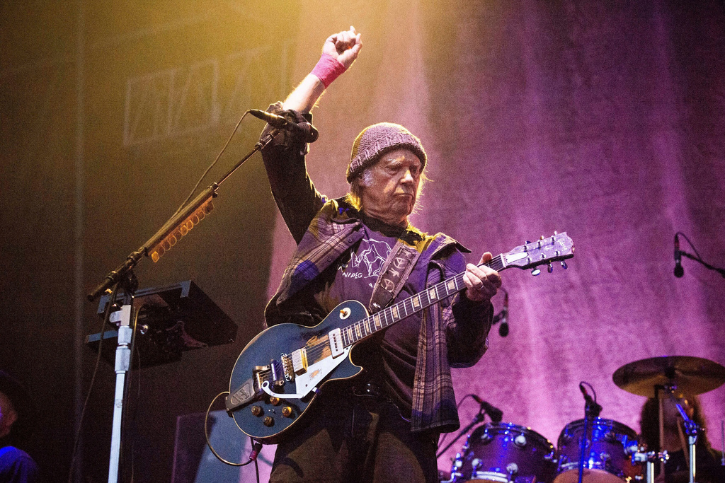 FILE - Neil Young performs at the BottleRock Napa Valley Music Festival in Napa, Calif., on May 25, 2019. (Photo by Amy Harris/Invision/AP, File)