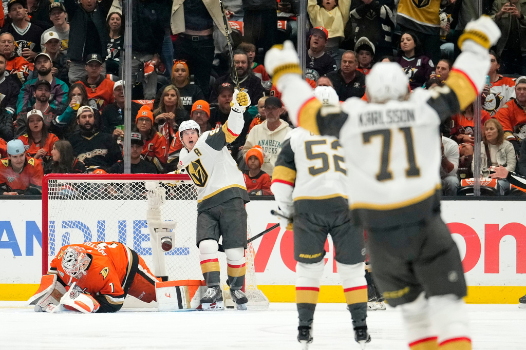 Vegas Golden Knights right wing Mitch Marner, second from right, celebrates after scoring on Anaheim Ducks goaltender Lukas Dostal, left, during the first period in Game 6 of a second-round NHL hockey Stanley Cup playoff series Thursday, May 14, 2026, in Anaheim, Calif. (AP Photo/Mark J. Terrill)
