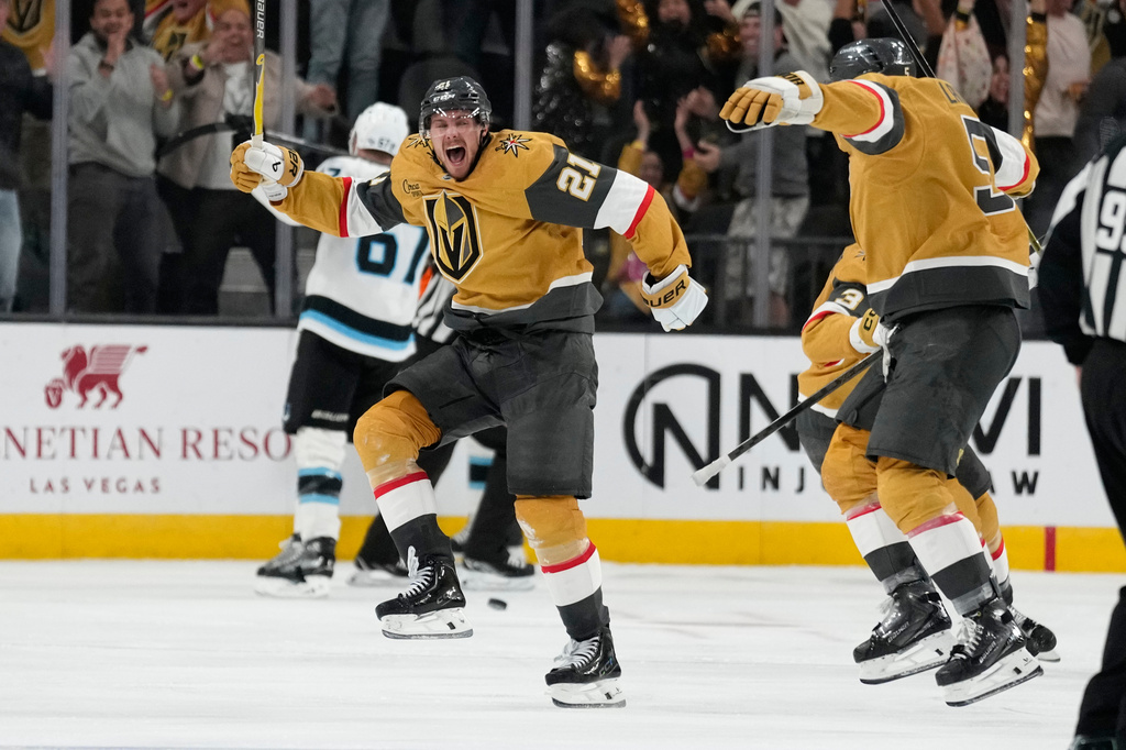 Vegas Golden Knights center Brett Howden (21) celebrates after scoring against the Utah Mammoth in the second overtime of Game 5 of a first-round NHL hockey Stanley Cup playoff series Wednesday, April 29, 2026, in Las Vegas. (AP Photo/John Locher)