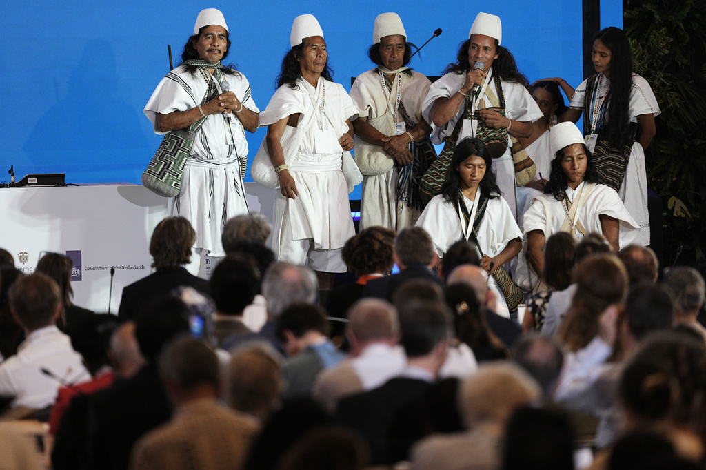 Members of the Indigenous Arhuaco community perform during a conference aimed at transitioning away from fossil fuels Tuesday, April 28, 2026, in Santa Marta, Colombia. (AP Photo/Ivan Valencia)