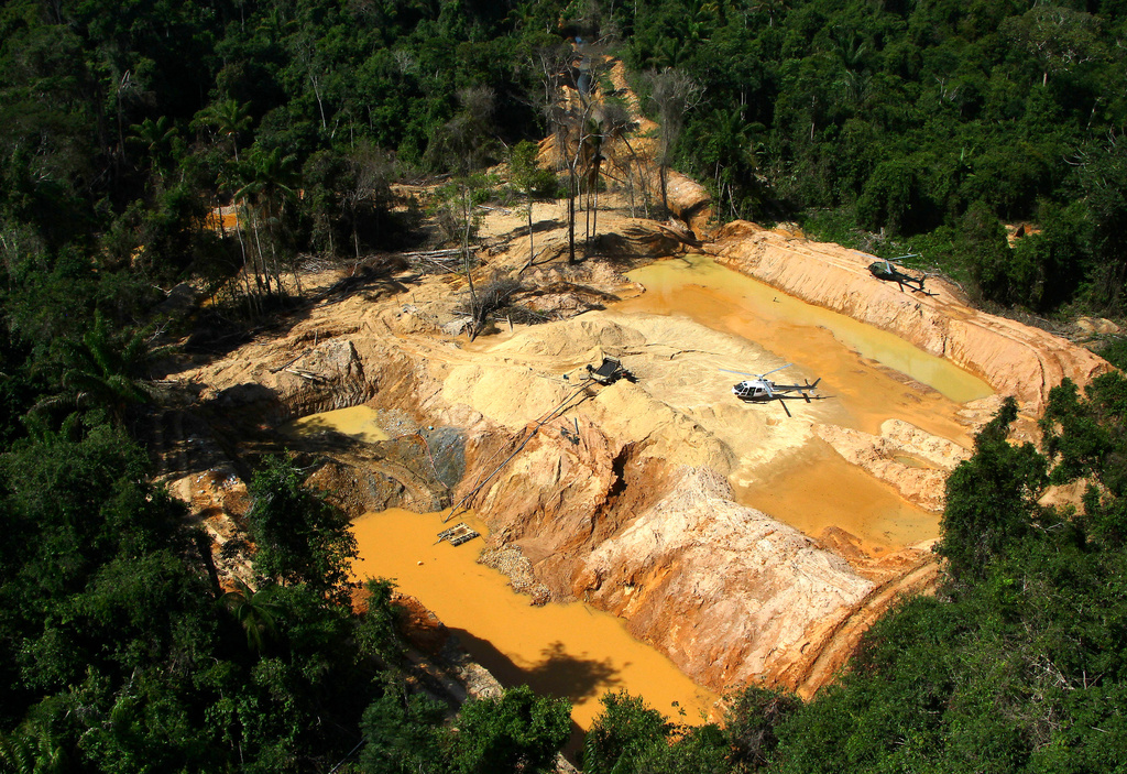 FILE - An illegal mining camp is visible from a Brazil Environmental Agency helicopter during an operation to try to contain illegal mining in Yanomami Indigenous territory, Roraima state, Brazil, Feb. 11, 2023. (AP Photo/Edmar Barros, File)