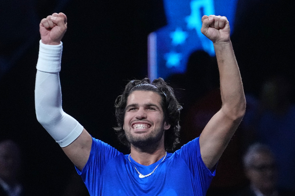 Team Europe's Carlos Alcaraz celebrates after beating Team World's Taylor Fritz during a Laver Cup tennis tournament match in London, Saturday, Sept. 26, 2026. (AP Photo/Maja Smiejkowska)