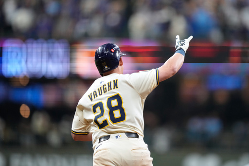 Milwaukee Brewers first baseman Andrew Vaughn (28) reacts after hitting a solo home run against the Chicago Cubs during the fourth inning of Game 5 of baseball's National League Division Series, Saturday, Oct. 11, 2025, in Milwaukee. (AP Photo/Kayla Wolf) Milwaukee Brewers first baseman Andrew Vaughn (28) reacts after hitting a solo home run against the Chicago Cubs during the fourth inning of Game 5 of baseball's National League Division Series, Saturday, Oct. 11, 2025, in Milwaukee. (AP Photo/Kayla Wolf)