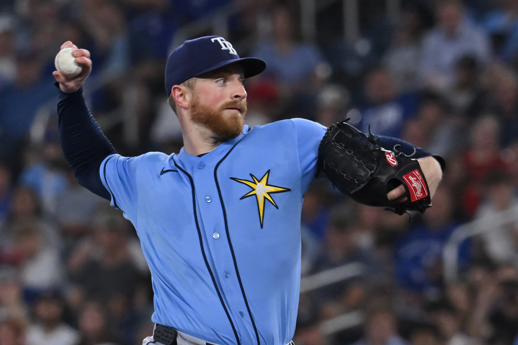Tampa Bay Rays starting pitcher Drew Rasmussen throws to a Toronto Blue Jays batter during the first inning of a baseball game in Toronto on Tuesday, July 21, 2026. (Jon Blacker/The Canadian Press via AP)