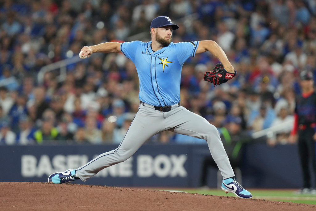 Tampa Bay Rays pitcher Adrian Houser (37) works against the Toronto Blue Jays during first inning MLB baseball action in Toronto on Friday, Sept. 26, 2025. (Chris Young/The Canadian Press via AP)