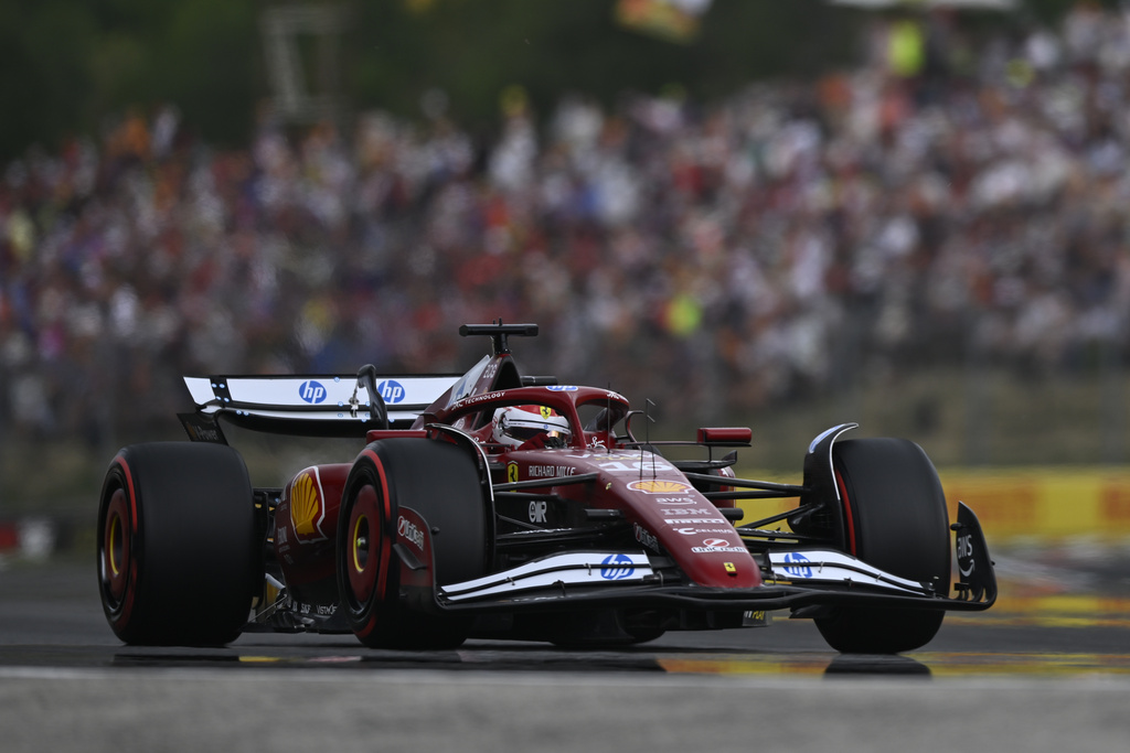Ferrari driver Charles Leclerc of Monaco steers his car during the qualifying session for the Hungarian Formula One Grand Prix at the Hungaroring racetrack in Mogyorod, Hungary, Saturday, Aug. 2, 2025. (AP Photo/Denes Erdos)