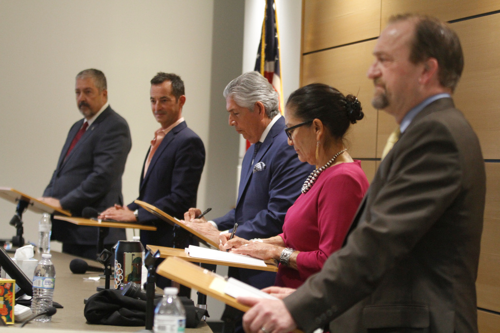 Candidates for governor of New Mexico participate in a public forum in Rio Rancho, N.M., on April 28, 2026, ahead of a June 2 primary election: From left to right, they are Democratic Bernalillo County District Attorney Sam Bregman, Republican businessman Doug Turner; Republican cannabis entrepreneur and health care expert Duke Rodriguez, Democratic former U.S. Interior Secretary Deb Haaland, and Republican former Rio Rancho mayor Gregg Hull. (AP Photo/Morgan Lee)