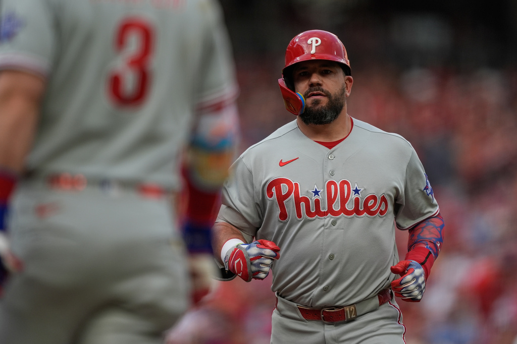 Philadelphia Phillies' Kyle Schwarber scores after hitting a two-run homer during the third inning of a baseball game against the Cincinnati Reds in Cincinnati, Tuesday, July 7, 2026. (AP Photo/Carolyn Kaster)