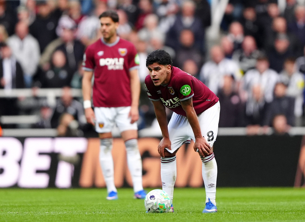 West Ham United's Mateus Fernandes reacts after conceding their side's third goal of the game during their English Premier League soccer match against Newcastle United in Newcastle upon Tyne, England, Sunday, May 17, 2026. (Owen Humphreys/PA via AP)