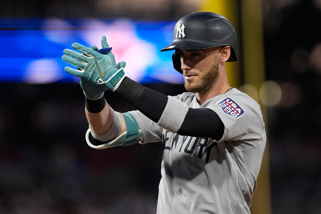 New York Yankees' Cody Bellinger reacts after hitting a two-run single against Philadelphia Phillies' Cristopher Sanchez in the first inning during the MLB baseball All-Star Game between the American League and National League, Tuesday, July 14, 2026, in Philadelphia. (AP Photo/Matt Slocum)