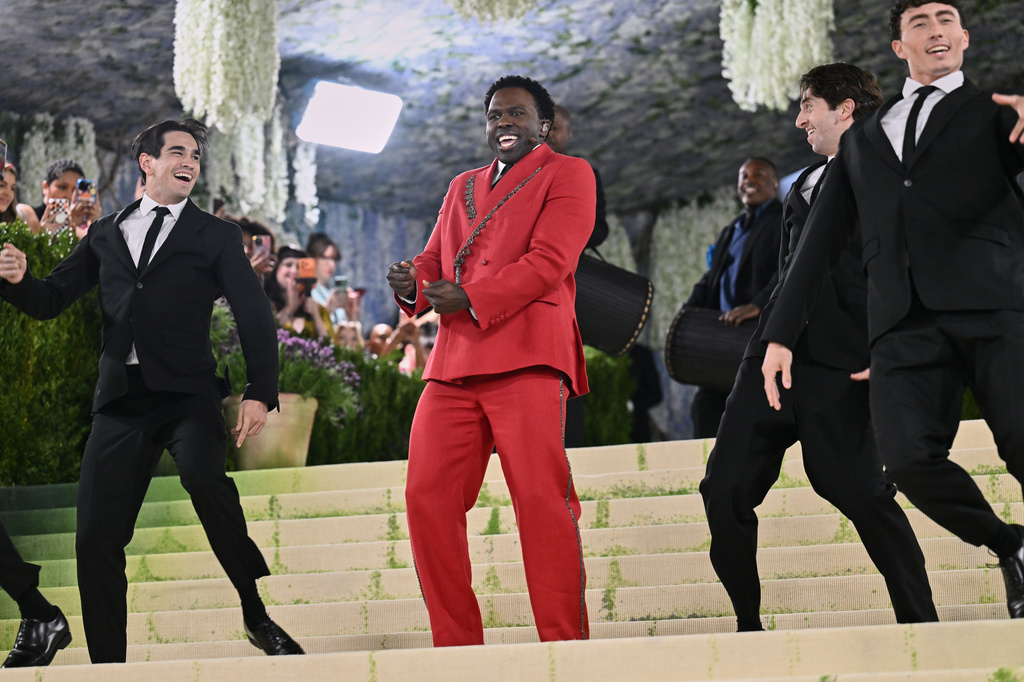 Joshua Henry, center, performs at The Metropolitan Museum of Art's Costume Institute benefit gala celebrating the opening of the "Costume Art" exhibition on Monday, May 4, 2026, in New York. (Photo by Evan Agostini/Invision/AP)