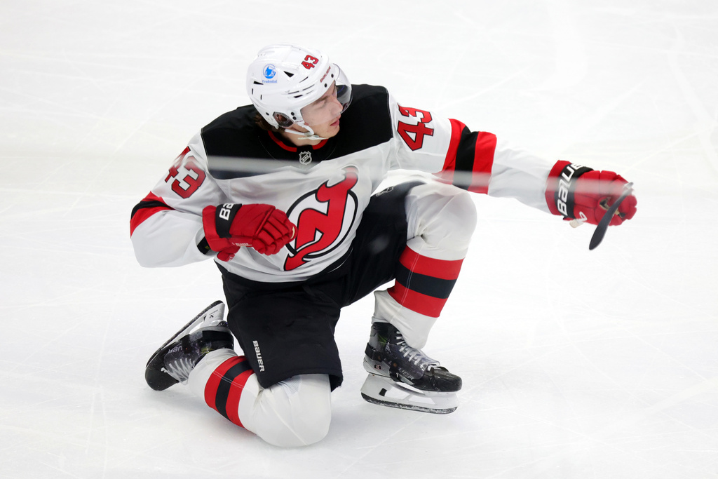 New Jersey Devils defenseman Luke Hughes celebrates his goal against the Columbus Blue Jackets during the third period of an NHL hockey game in Columbus, Ohio, Wednesday, Dec. 31, 2025. (AP Photo/Paul Vernon)