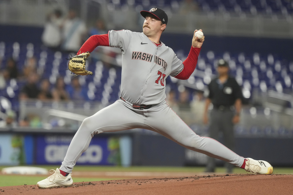 Washington Nationals pitcher Mitchell Parker (70) aims a pitch during the first inning of a baseball game against the Miami Marlins Tuesday, Sept. 9, 2025, in Miami. (AP Photo/Marta Lavandier)
