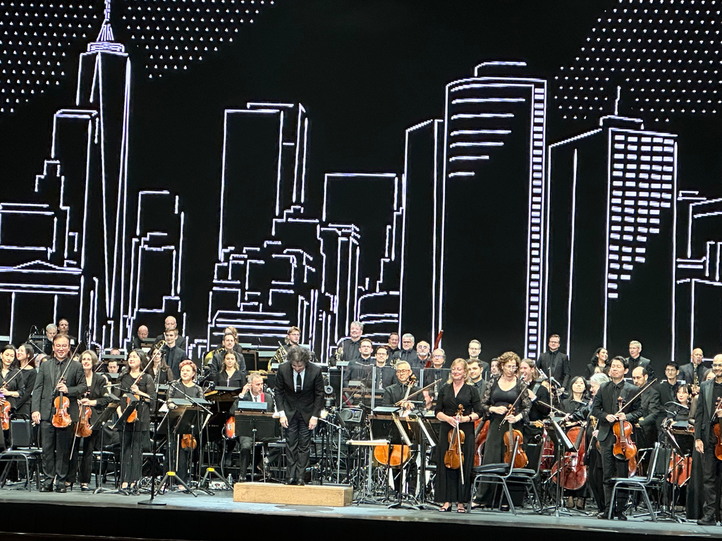 Gustavo Dudamel takes the podium for his first concert as music director of the New York Philharmonic at Radio City Music Hall on Thursday, Sept. 10, 2026 (AP Photo/Ron Blum)