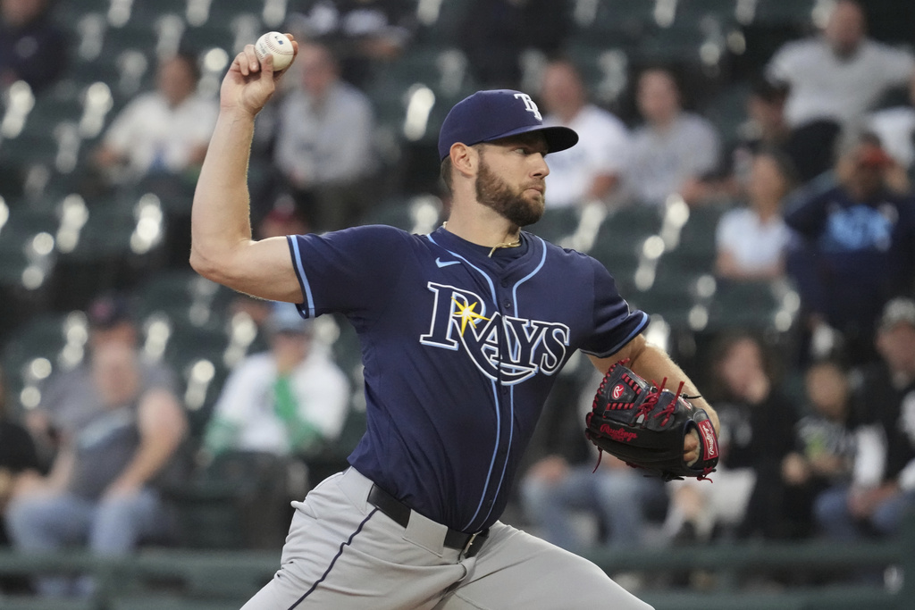 Tampa Bay Rays starting pitcher Adrian Houser throws against the Chicago White Sox during the first inning of a baseball game in Chicago, Tuesday, Sept. 9, 2025. (AP Photo/Nam Y. Huh)