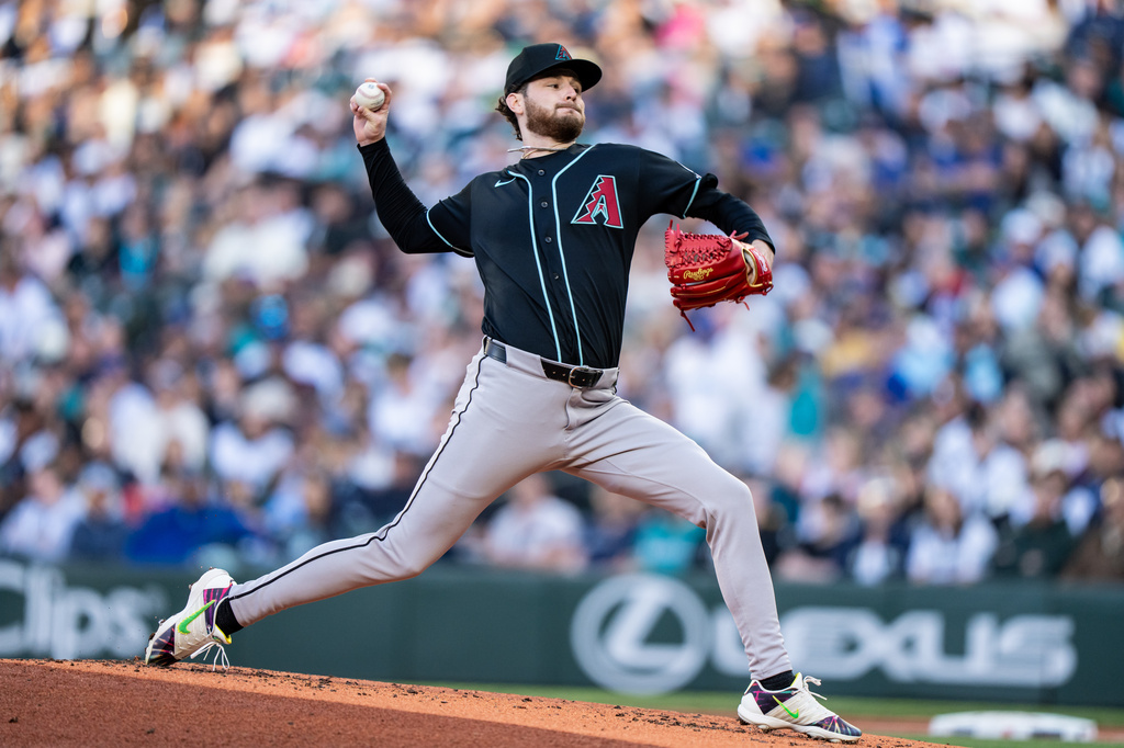 Arizona Diamondbacks starter Ryne Nelson delivers a pitch during the second inning of a baseball game against the Seattle Mariners, Saturday, May 30, 2026, in Seattle. (AP Photo/Stephen Brashear)