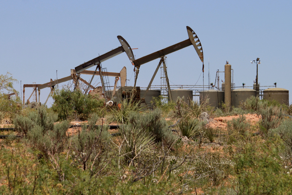 FILE - Pump jacks operate in the Permian Basin east of Carlsbad, N.M., on Tuesday, May 20, 2025. (AP Photo/Susan Montoya Bryan, File)