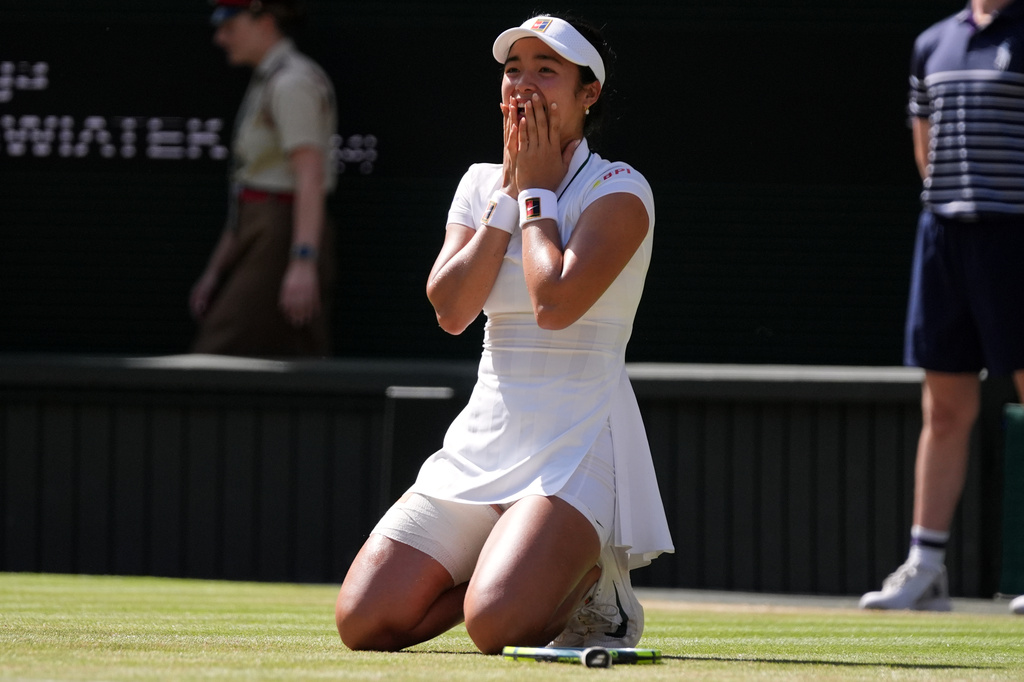 Alexandra Eala of the Philippines celebrates winning the third round women's singles match against Iga Swiatek of Poland at the Wimbledon Tennis Championships in London, Saturday, July 4, 2026.(AP Photo/Maja Smiejkowska)