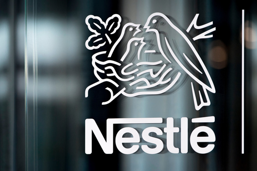 FILE - In this Thursday, Feb. 14, 2019, file photo, Nestle's logo is displayed on a window, during the 2018 full-year results press conference of the food and drinks giant Nestle, in Vevey. (Laurent Gillieron/Keystone via AP, File) FILE - In this Thursday, Feb. 14, 2019, file photo, Nestle's logo is displayed on a window, during the 2018 full-year results press conference of the food and drinks giant Nestle, in Vevey. (Laurent Gillieron/Keystone via AP, File)