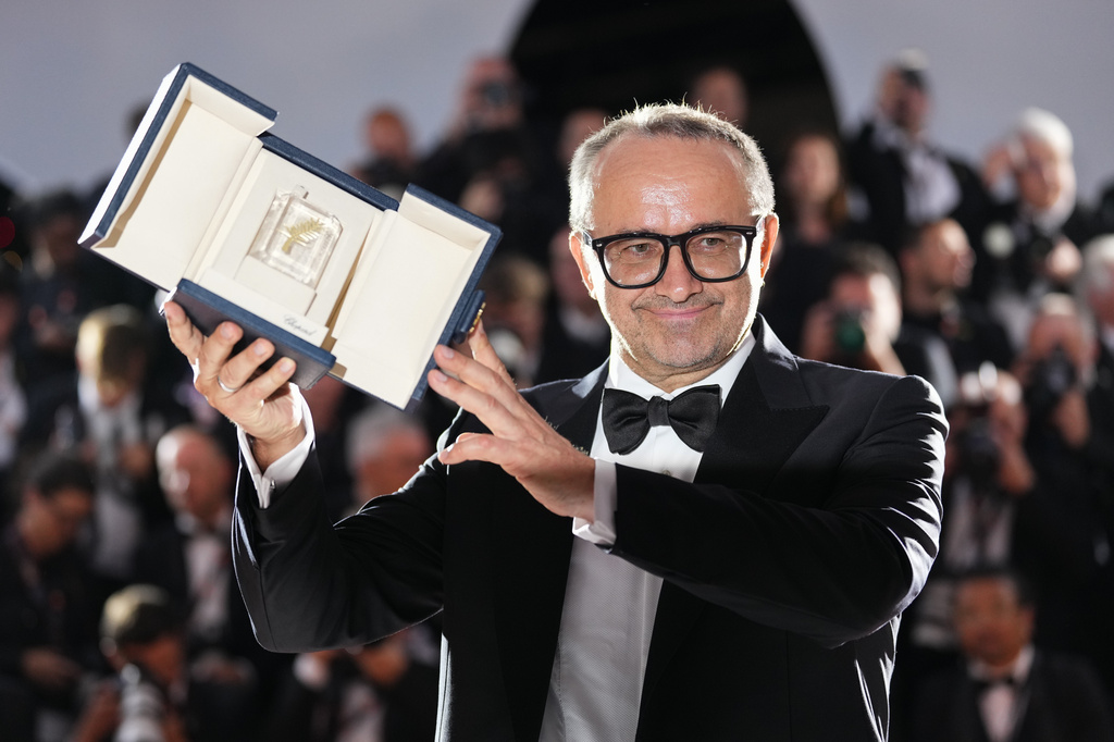 Andrey Zvyagintsev, winner of the grand prize for 'Minotaur,' poses for photographers at the awards ceremony photo call during the 79th international film festival, Cannes, southern France, Saturday, May 23, 2026. (Photo by Scott A Garfitt/Invision/AP)
