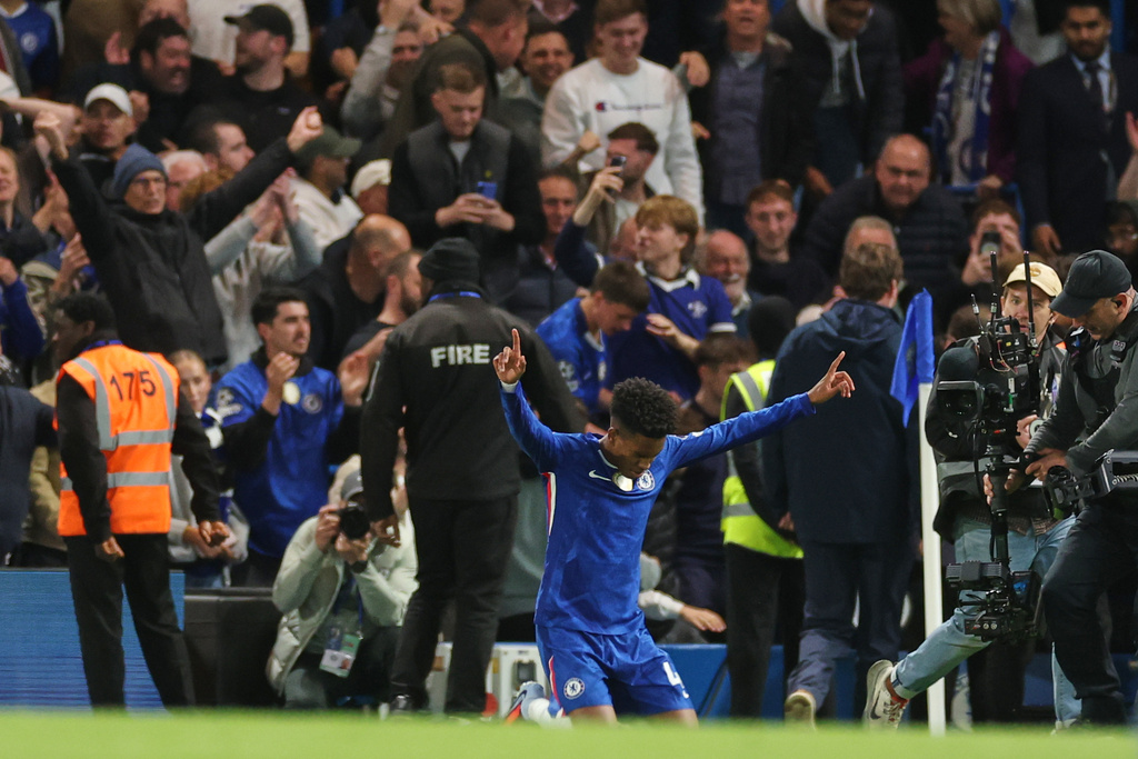 Chelsea's Estevao celebrates after scoring his side's second goal during the English Premier League soccer match between Chelsea and Liverpool at Stamford Bridge in London, Saturday, Oct. 4, 2025. (AP Photo/Ian Walton)