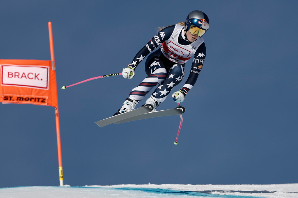 United States' Lindsey Vonn speeds down the course during an alpine ski, women's World Cup downhill in St. Moritz, Switzerland, Friday Dec. 12, 2025. (AP Photo/Gabriele Facciotti)