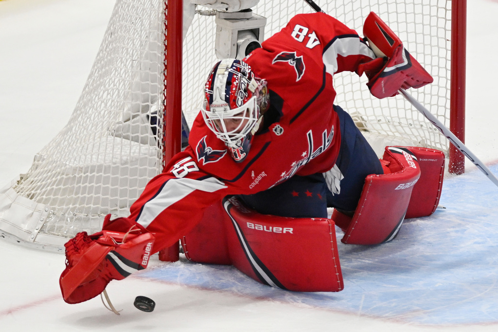 Washington Capitals goaltender Logan Thompson (48) stops a puck during the first period of an NHL hockey game against the St. Louis Blues, Wednesday, Nov. 5, 2025, in Washington. (AP Photo/John McDonnell)