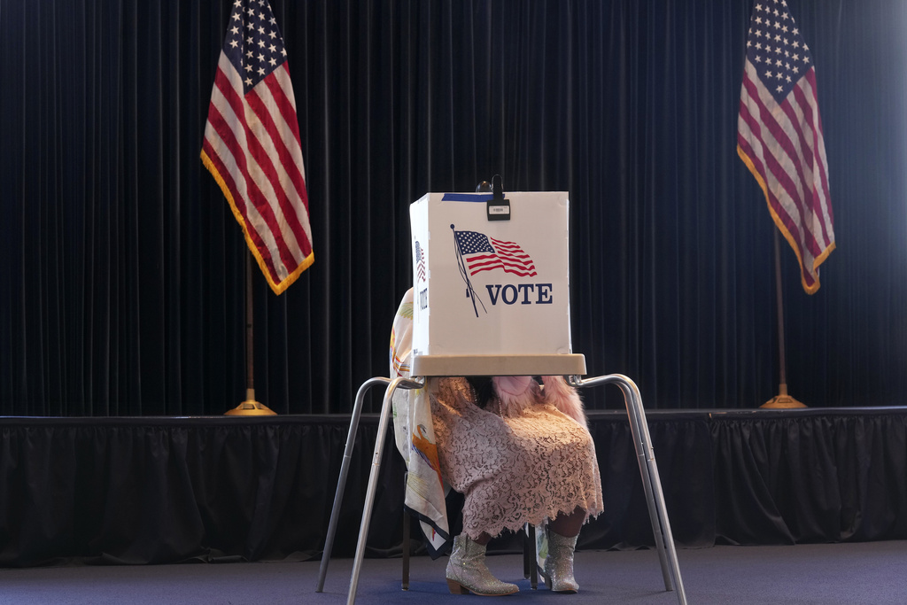 Chris Pizzello A voter works on her ballot at a polling place at the Ronald Reagan Presidential Library on Election Day, Tuesday, Nov. 5, 2024, in Simi Valley, Calif. (AP Photo/Chris Pizzello)
