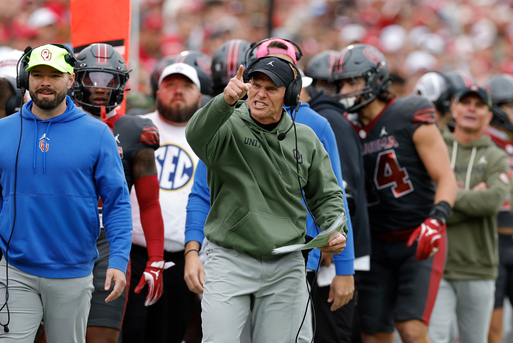 Oklahoma head coach Brent Venables yells at a referee after a play against Missouri during the first half of an NCAA college football game Saturday, Nov. 22, 2025, in Norman, Okla. (AP Photo/Alonzo Adams)