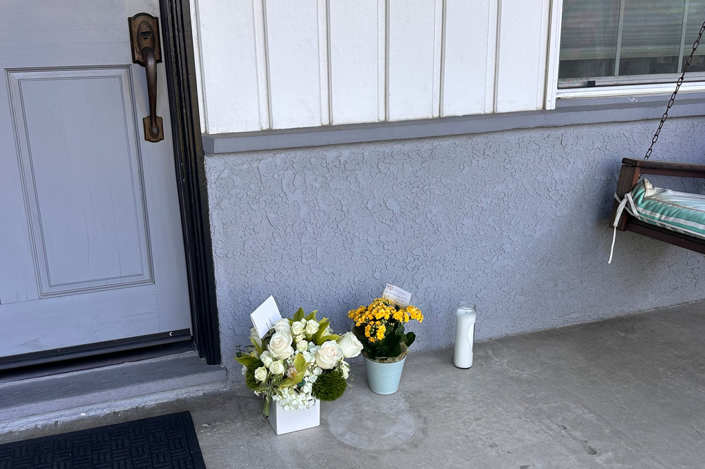 Flowers sit outside a home on June 5, 2026, in Los Angeles, where authorities found actor James Handy with stab wounds. (AP Photo/Andrew Dalton)
