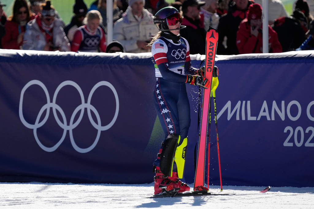 United States' Mikaela Shiffrin at the finish area of an alpine ski, women's slalom race, at the 2026 Winter Olympics, in Cortina d'Ampezzo, Italy, Wednesday, Feb. 18, 2026. (AP Photo/Andy Wong)