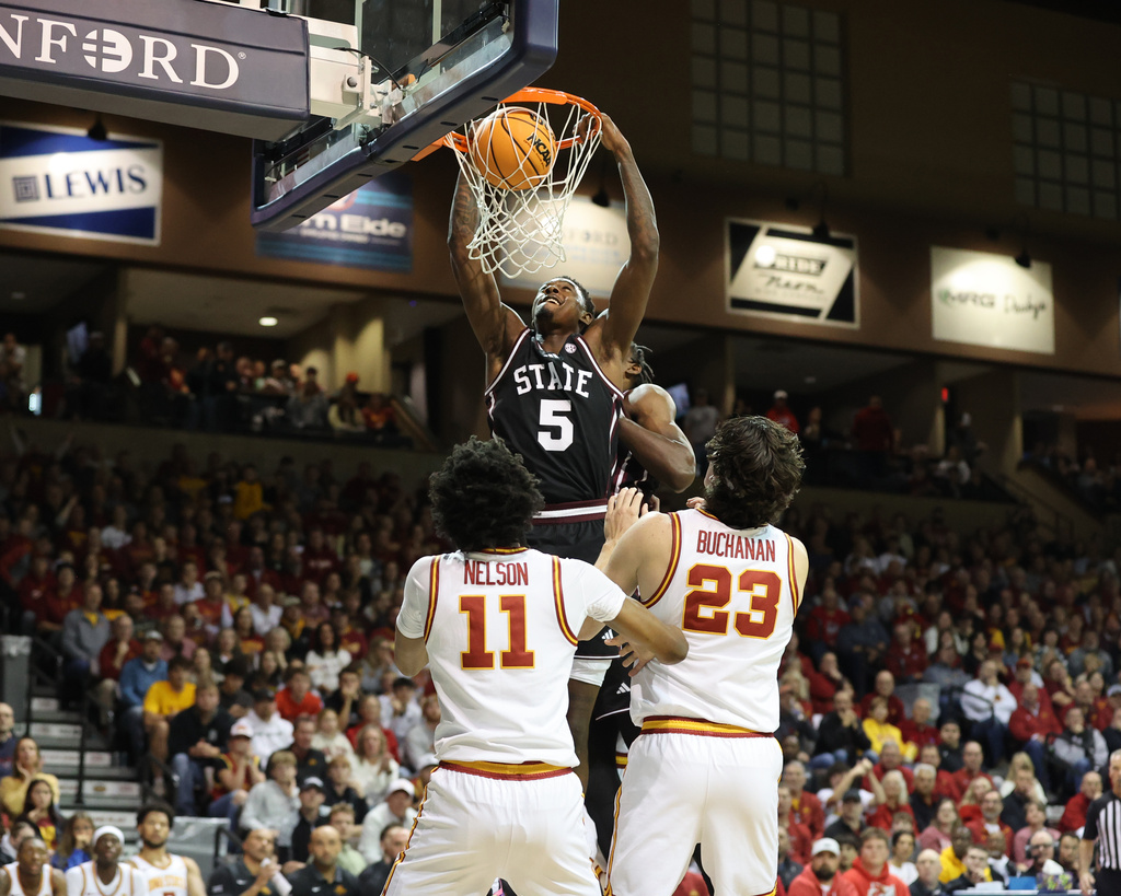 Mississippi State guard Shawn Jones Jr (5) dunks against Iowa State during the first half of an NCAA college basketball game, Monday, Nov. 10, 2025, in Sioux Falls, S.D. (AP Photo/Josh Jurgens)
