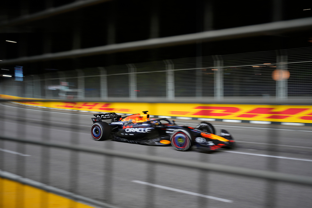 Red Bull driver Max Verstappen of the Netherlands steers his car during the Singapore Formula One Grand Prix at the Marina Bay Street Circuit in Singapore, Sunday, Oct. 5, 2025. (AP Photo/Vincent Thian)
