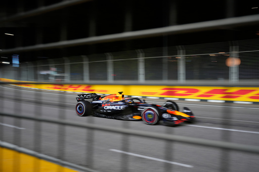 Red Bull driver Max Verstappen of the Netherlands steers his car during the Singapore Formula One Grand Prix at the Marina Bay Street Circuit in Singapore, Sunday, Oct. 5, 2025. (AP Photo/Vincent Thian) Red Bull driver Max Verstappen of the Netherlands steers his car during the Singapore Formula One Grand Prix at the Marina Bay Street Circuit in Singapore, Sunday, Oct. 5, 2025. (AP Photo/Vincent Thian)