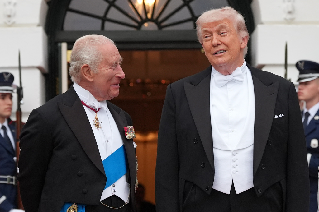 President Donald Trump greets Britain's King Charles III at the South Portico of the White House for a State Dinner Tuesday, April 28, 2026, in Washington. (AP Photo/Alex Brandon)