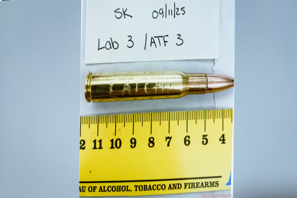 An image of a bullet casing engraved with the word "Catch!" is displayed during a preliminary hearing for Tyler Robinson, who is accused in the fatal shooting of Charlie Kirk, at the Fourth District Courthouse in Provo, Utah, Thursday, July 9, 2026. (AP Photo/Spenser Heaps, Pool)