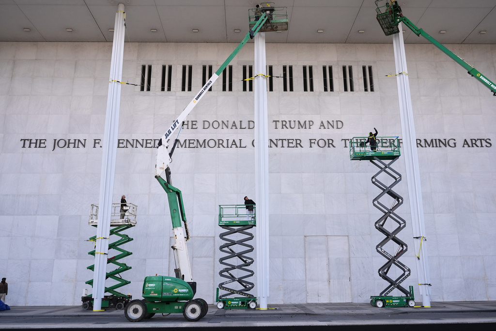 FILE - New signage, The Donald J. Trump and The John F. Kennedy Memorial Center For The Performing Arts, is unveiled on the Kennedy Center in Washington, Dec. 19, 2025. (AP Photo/Jacquelyn Martin), File)
