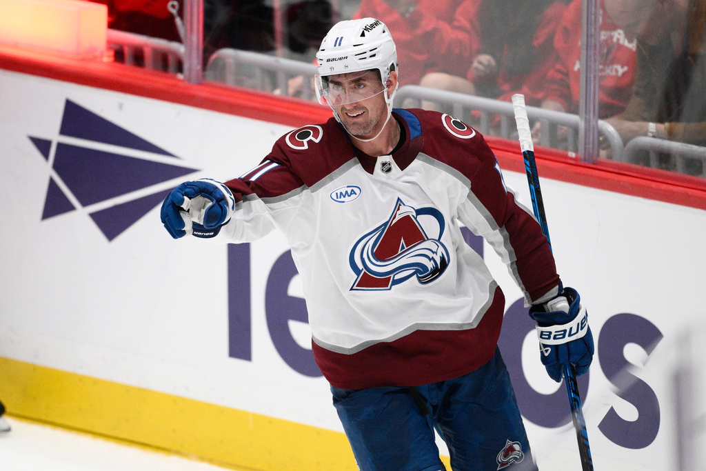 Colorado Avalanche center Brock Nelson celebrates after his winning goal during overtime of an NHL hockey game against the Washington Capitals, Sunday, March 22, 2026, in Washington. (AP Photo/Nick Wass)