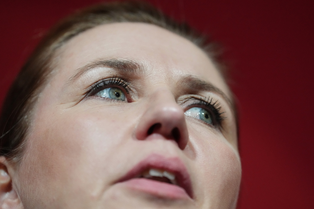 Danish Prime Minister Mette Frederiksen speaks to members of her Social Democratic Party in the Danish Parliament in Copenhagen, Denmark, after the General Election on Tuesday, March 24, 2026. (AP Photo/Sergei Grits)