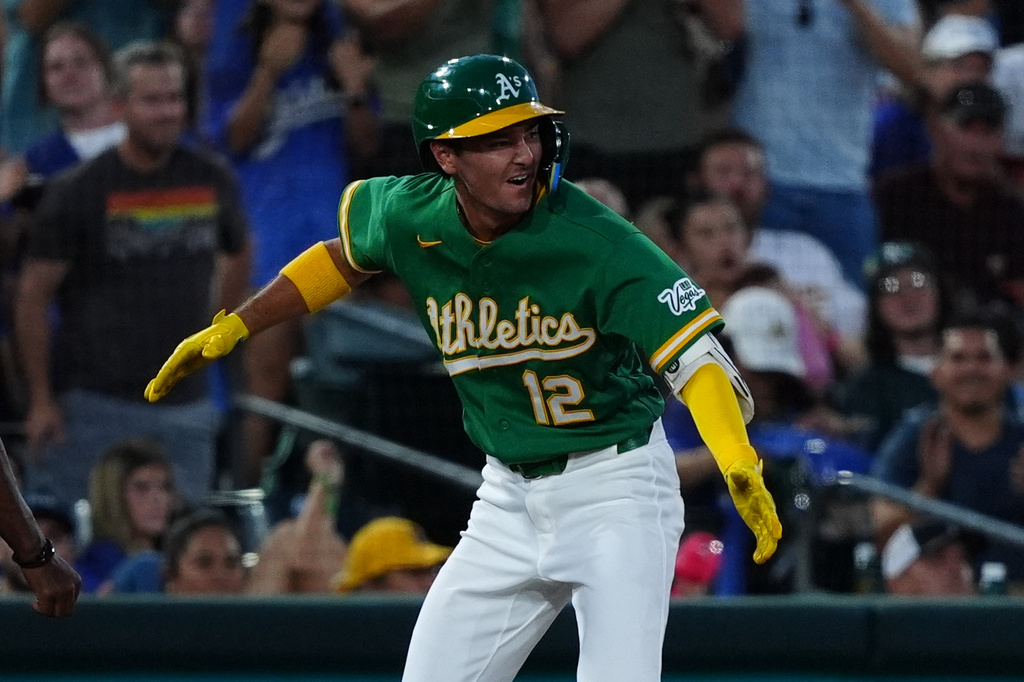 Athletics' Alika Williams (12) reacts after hitting a two-run RBI triple in the sixth inning during a baseball game against the Minnesota Twins Wednesday, Aug. 26, 2026, in West Sacramento, Calif. (AP Photo/Alan Greth)