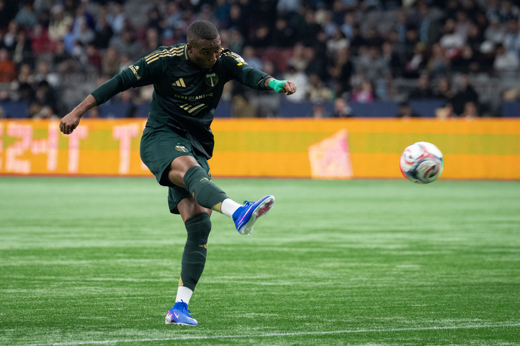 Portland Timbers' Juan Mosquera scores against the Vancouver Whitecaps during the first half of an MLS soccer match in Vancouver, British Columbia, on Saturday, April 4, 2026. (Ethan Cairns/The Canadian Press via AP)