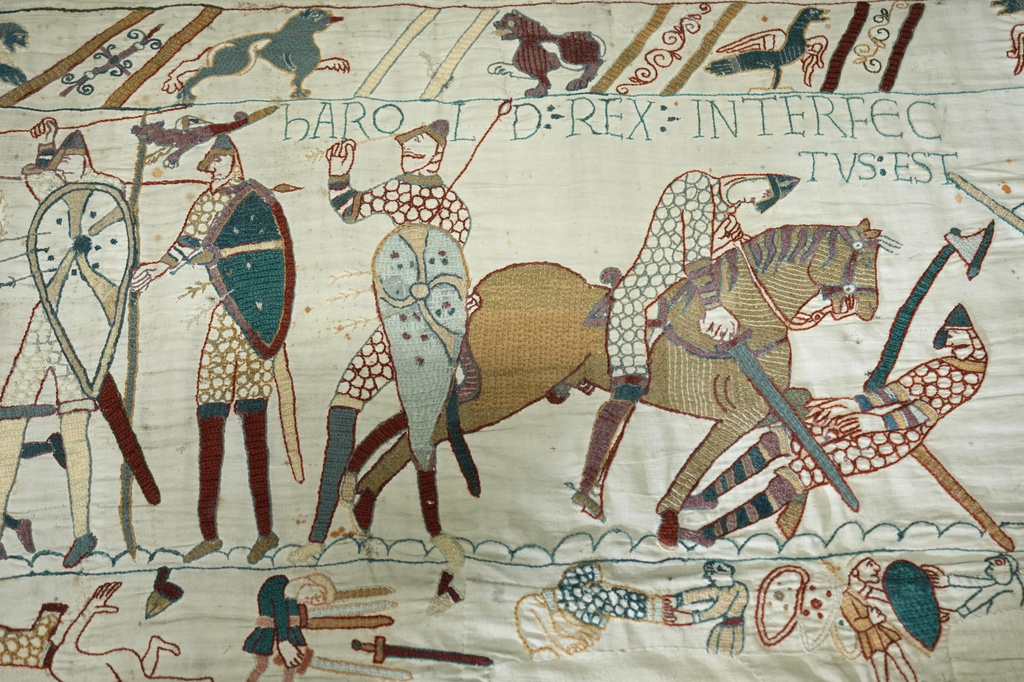 The 70-meter-long Bayeux Tapestry is displayed during a press preview at the British Museum in London after returning to England, following a historic agreement between the UK and France, Monday, Sept. 7, 2026. (AP Photo/Kin Cheung)