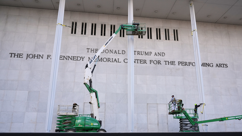 New signage, The Donald J. Trump and The John F. Kennedy Memorial Center for the Performing Arts, is unveiled on the Kennedy Center, Friday, Dec. 19, 2025, in Washington. (AP Photo/Jacquelyn Martin)