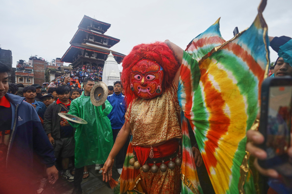 The Lakhe, a demon adored for divine might, performs during Indra Jatra, a festival that marks the end of the rainy season in Kathmandu, Nepal, Friday, Sept. 25, 2026. (AP Photo/Subash Shrestha)