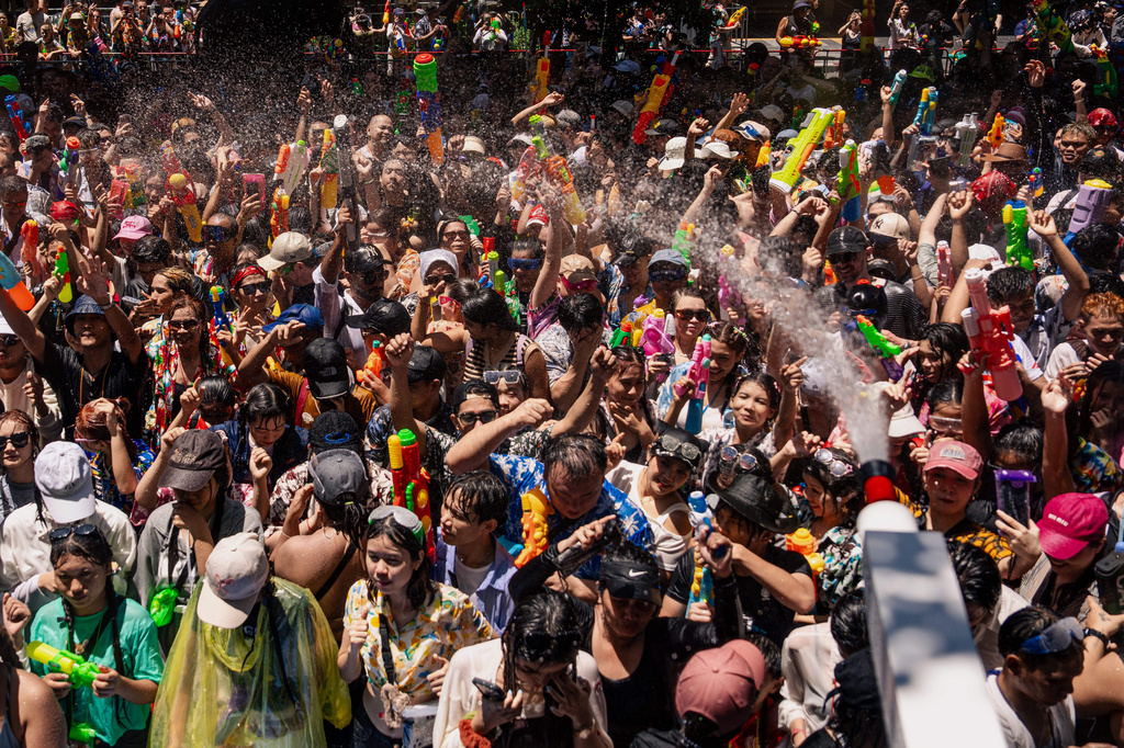 Peoples participate in the Songkran water festival to celebrate the Thai New Year in Bangkok, Thailand, Monday, April 13, 2026. (AP Photo/Arnun Chonmahatrakool)