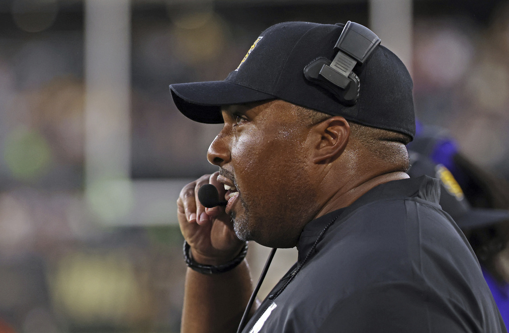 Kennesaw State head coach Jerry Mack directs his players in the first half of an NCAA college football game against Wake Forest, Friday, Aug. 29, 2025, in Winston-Salem, N.C. (Walt Unks/The Winston-Salem Journal via AP)