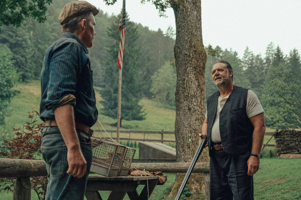 This image released by Vertical shows Ethan Hawke, left, and Russell Crowe in a scene from "The Weight." (Vertical via AP)