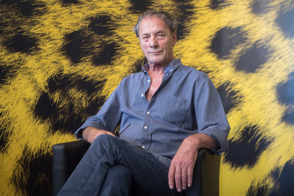 FILE - Palestinian actor Mohammed Bakri poses during the photocall for the film "Wajib" at the 70th Locarno International Film Festival in Locarno, Switzerland, on Aug. 5, 2017. (Urs Flueeler/Keystone via AP, File)