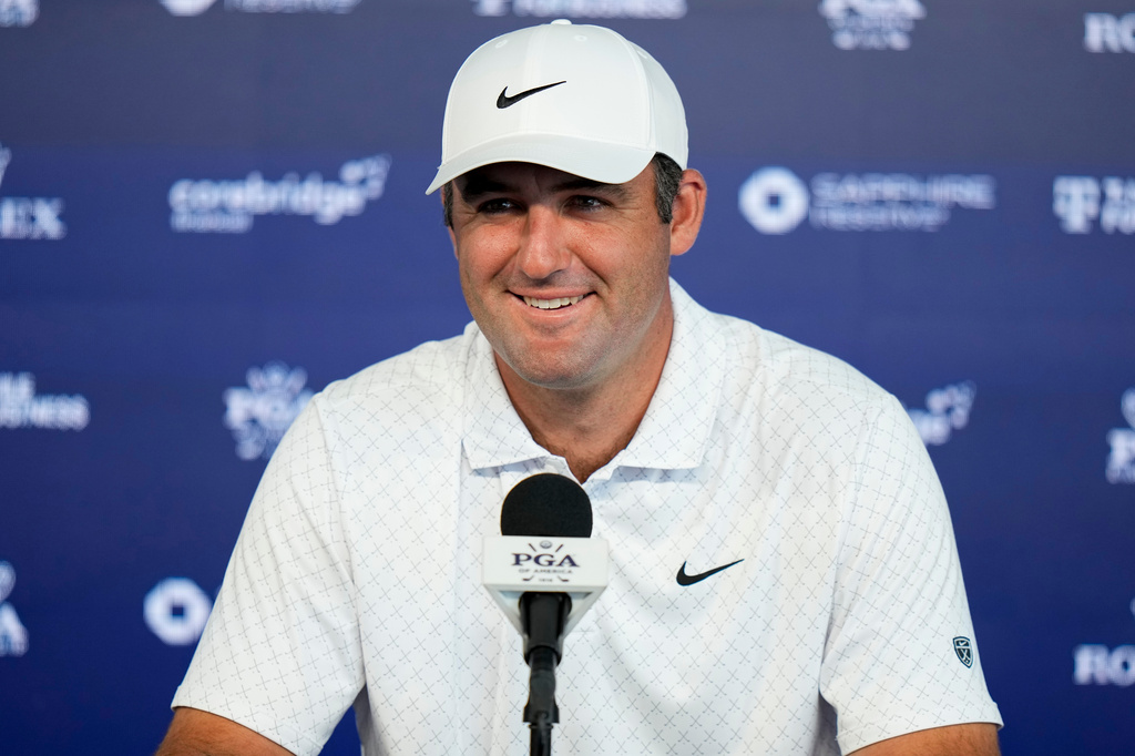 Scottie Scheffler speaks with the media after a PGA Championship golf tournament practice round at Aronimink Golf Club, Tuesday, May 12, 2026, in Newtown Square, PA. (AP Photo/Frank Franklin II)